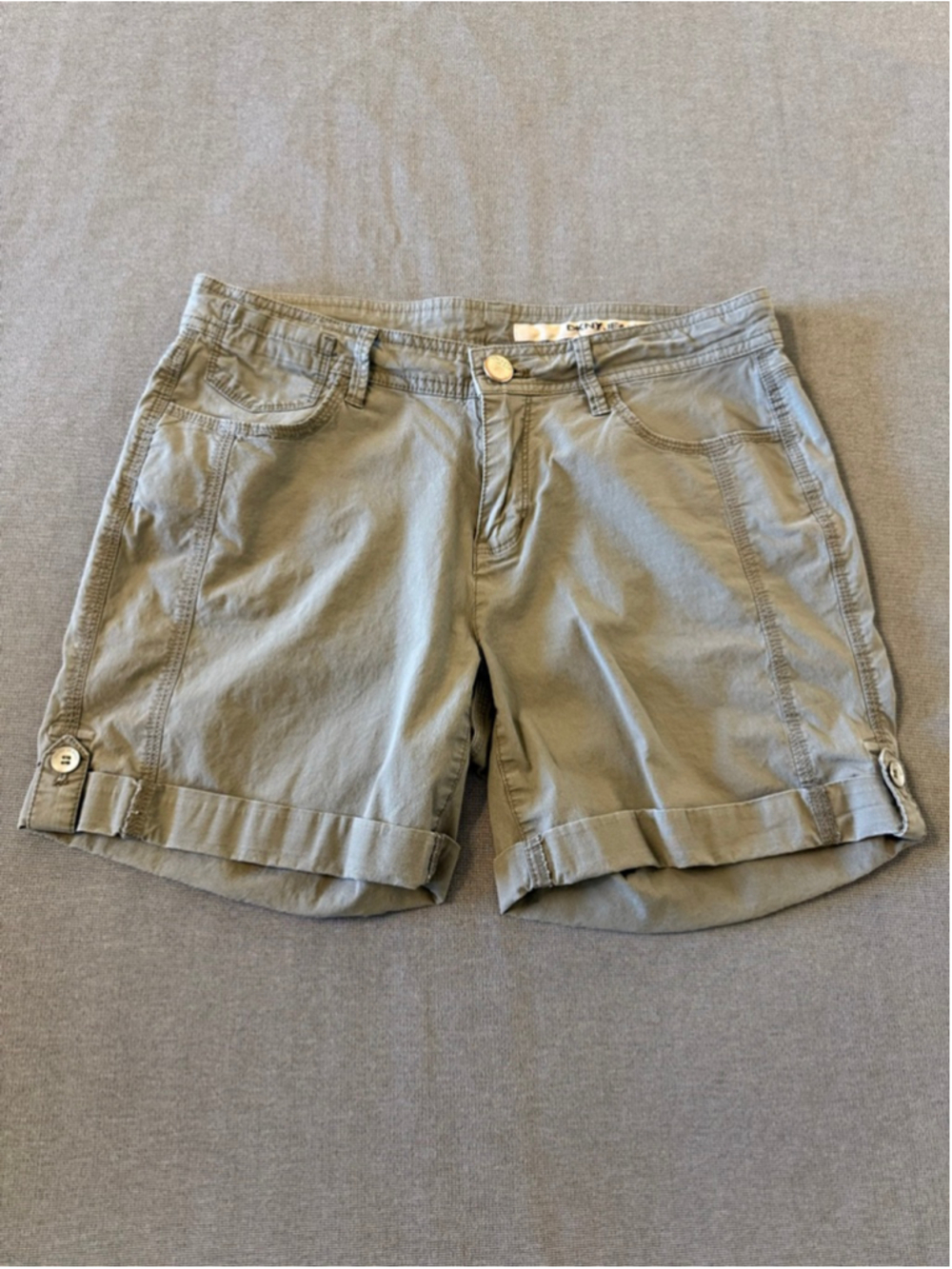 olive green DKNY Jeans women's roll-up tab shorts size 6